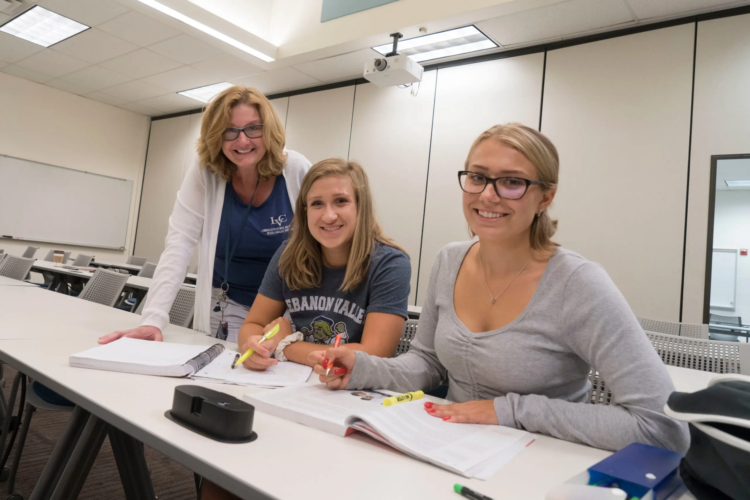 Kylie Beagell and Claire Bassler with Dr. Michelle Scesa