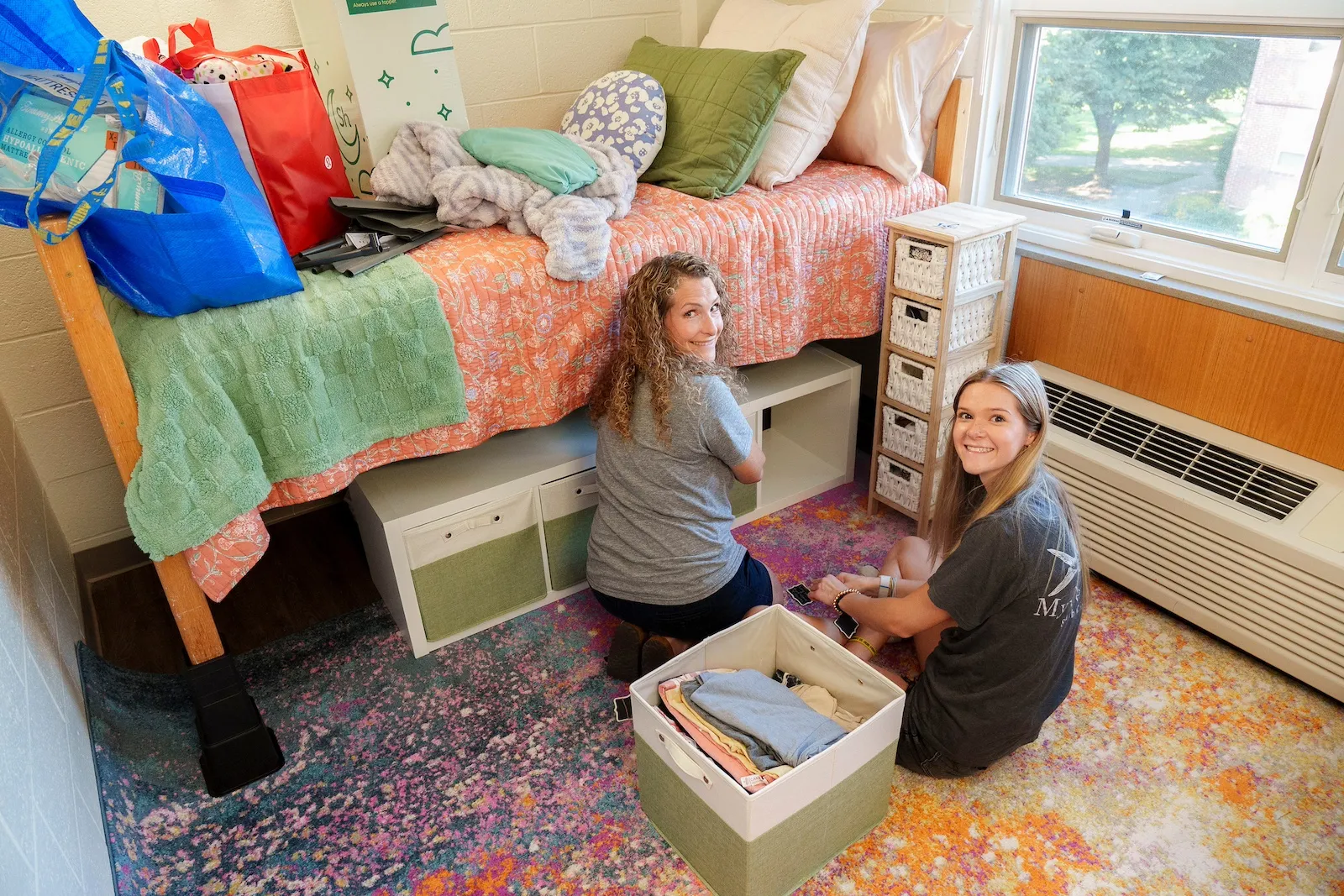 New student sets up dorm room with parent on move-in day 2024