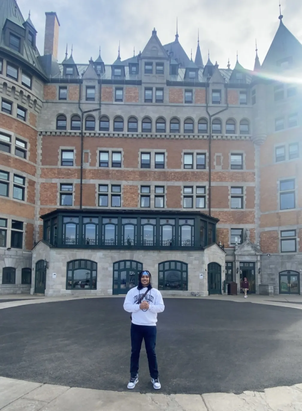 Tyler Hartl in front of Chateau Frontenac in Quebec City