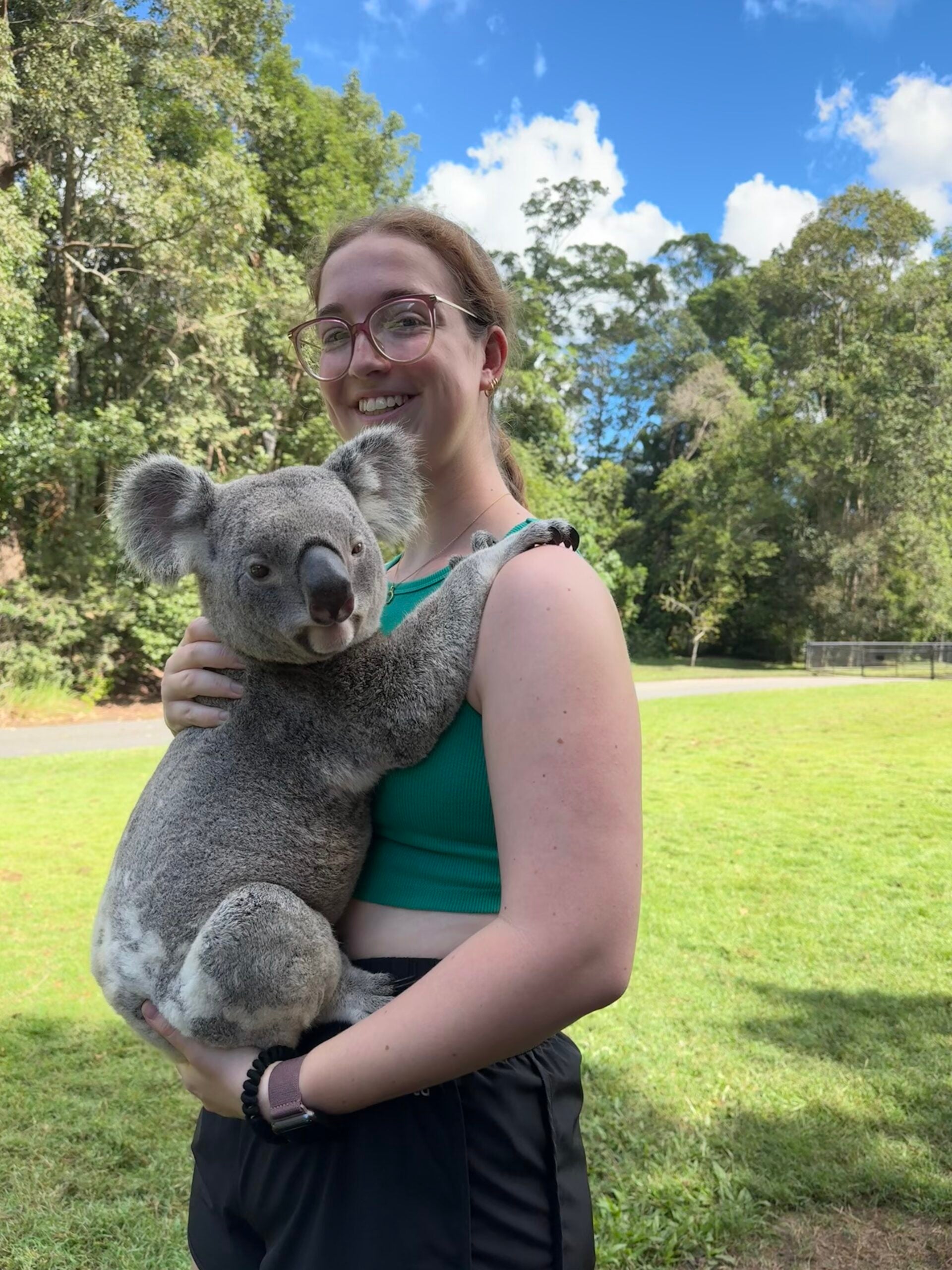Lauren Jancsarics with koala at Australia Zoo