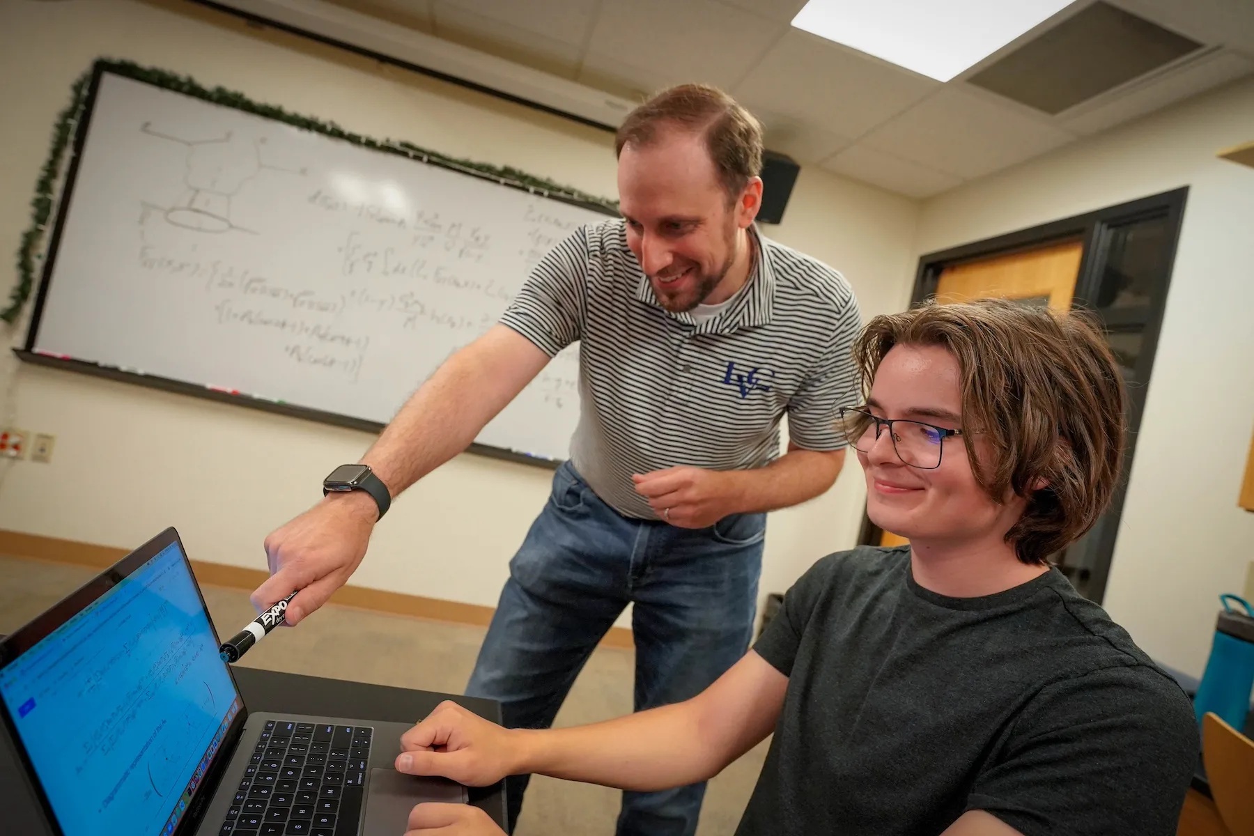 Student works with Dr. Dan Pitonyak on physics research over summer