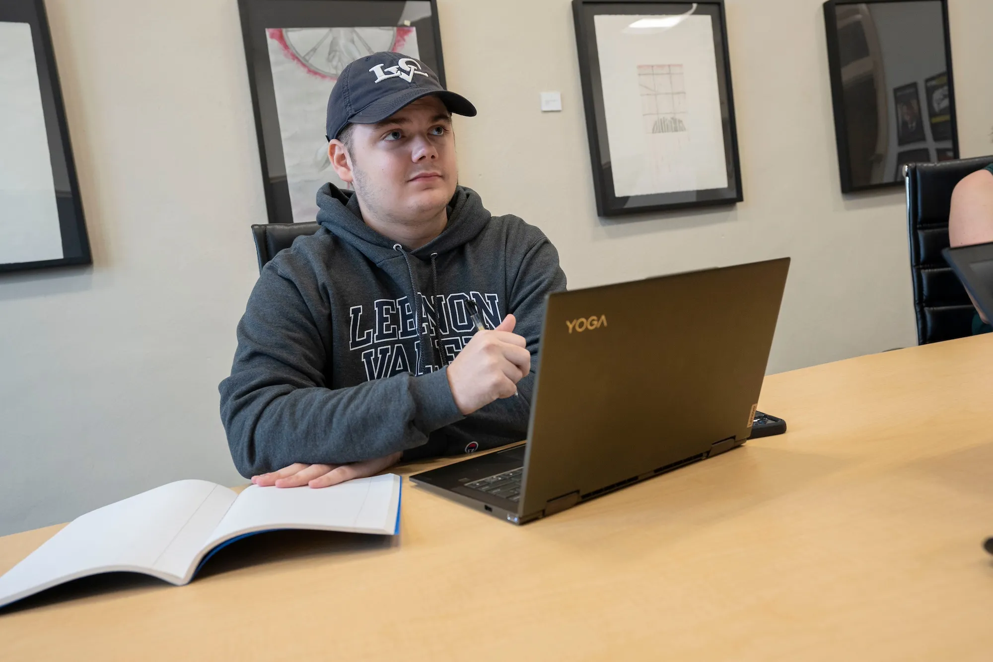 Student sits at table during sociology class