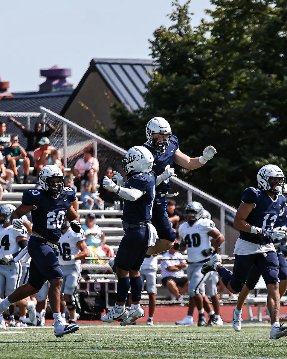 LVC Flying Dutchmen football players on field