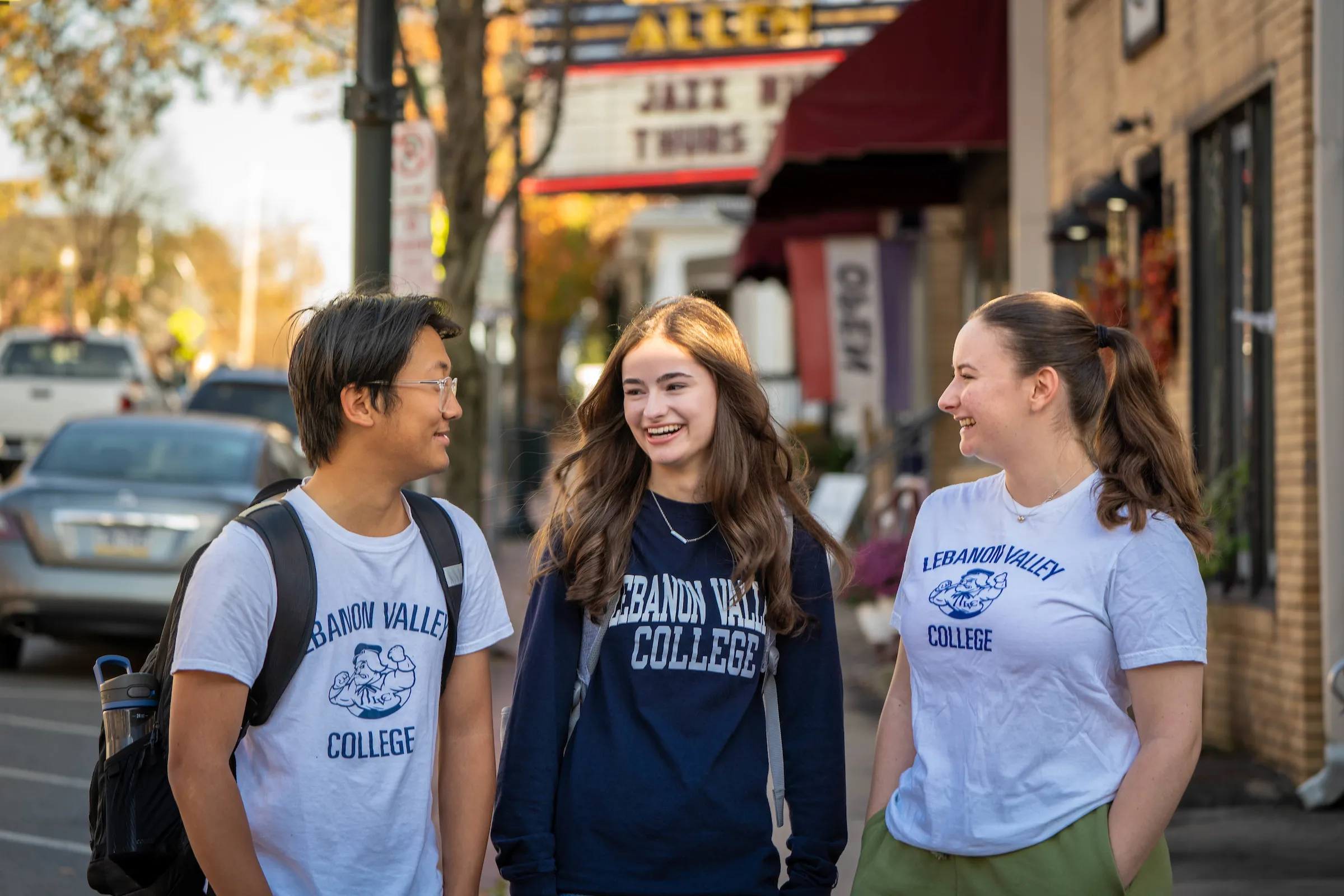 Michael Frentzen, Lauren Frazier, Michaela Cavallo walk down Main Street in Annville