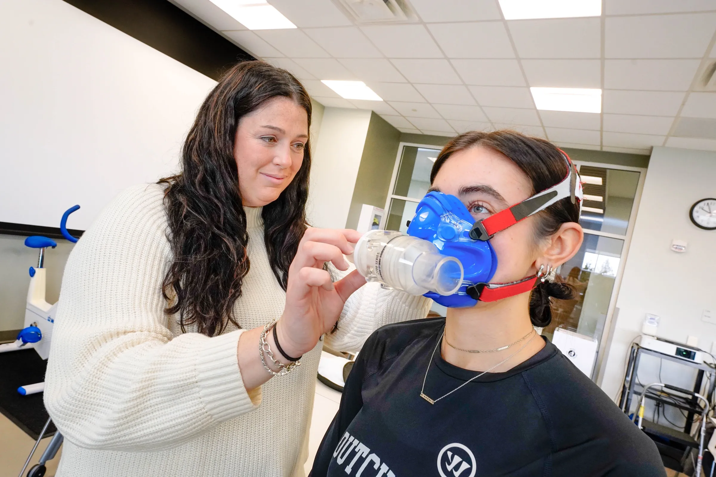 LVC exercise science student and faculty demonstrate equipment