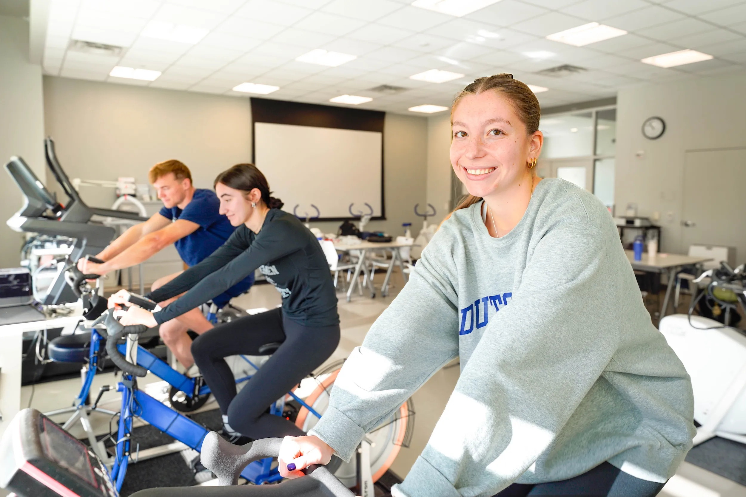 LVC exercise science students ride stationary bikes